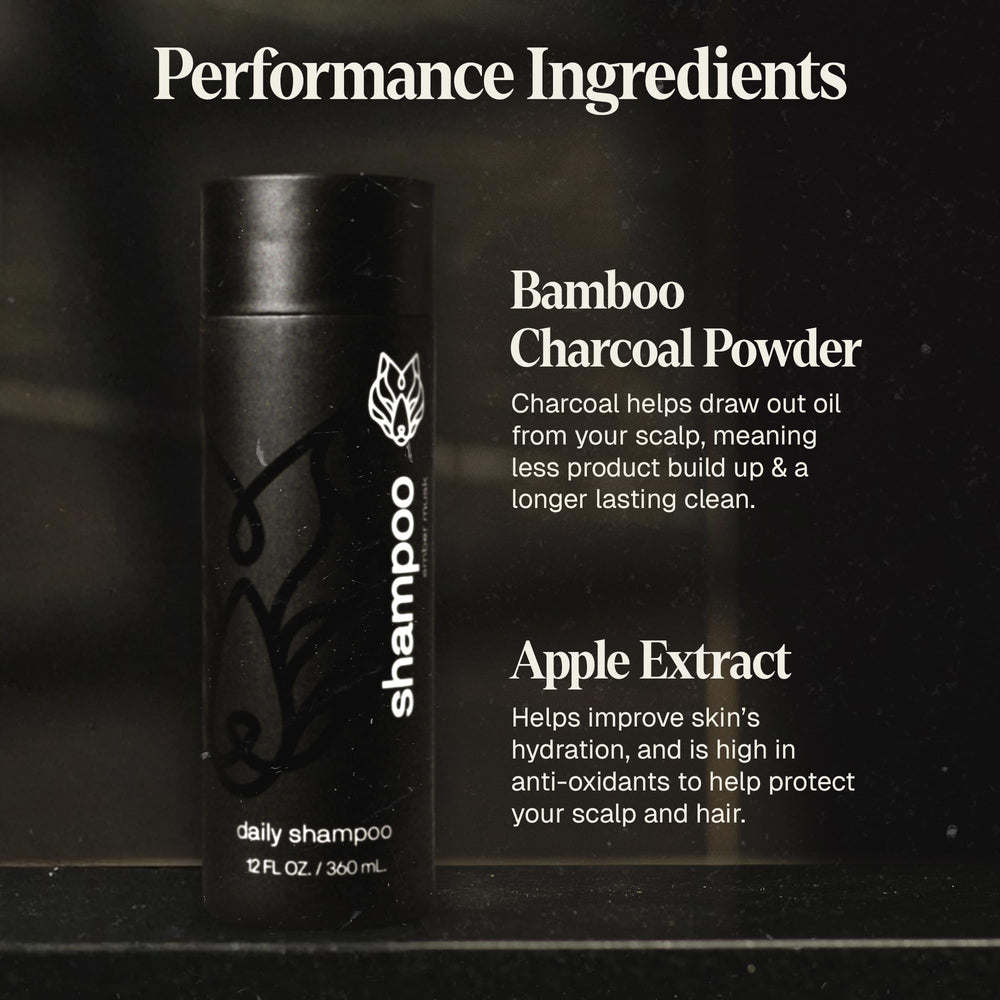 Black Wolf Everyday Shampoo pour demonstrating easy distribution for deep cleansing.