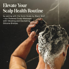 Black Wolf shampoo lather rising on wet hair for cleansing
