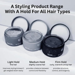 Black Wolf Styling Paste in hands dime-sized amount ready to apply.