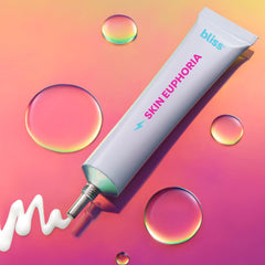 Gentle massage motion with Bliss Skin Euphoria serum for daily care.
