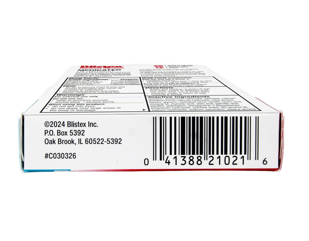 Blistex Lip Ointment swatch on skin shows smooth texture.