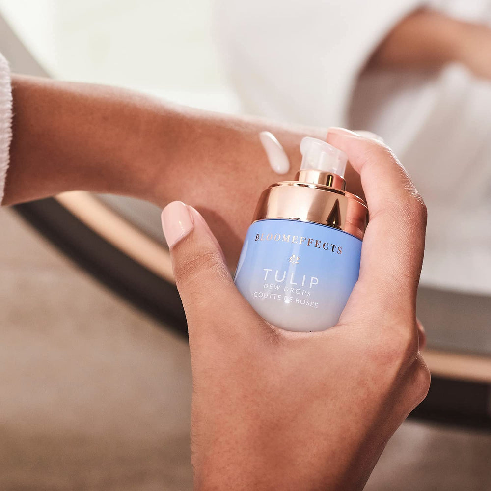 Bloomeffects Tulip Dew Drops drops on finger suggest quick absorption and hydration
