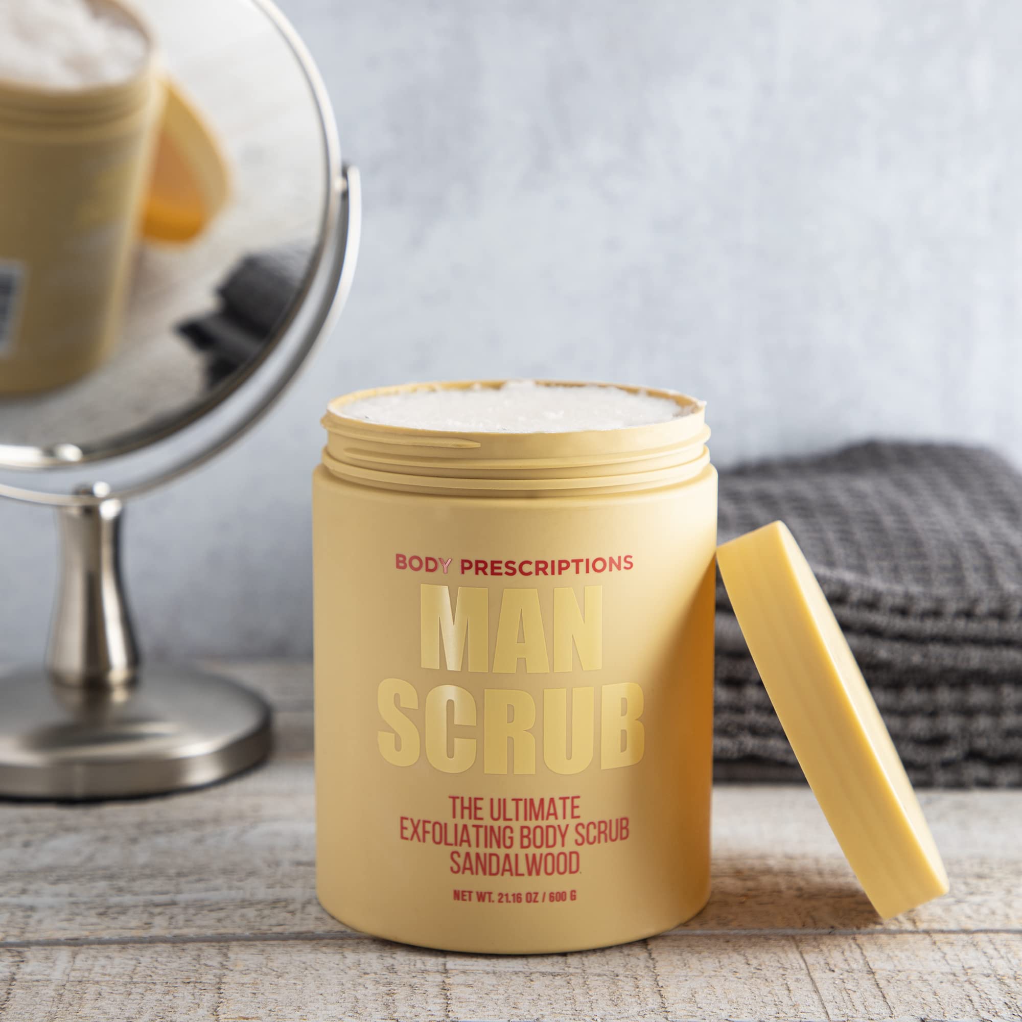 Body Prescriptions man scrub shower-application scene highlighting gentle exfoliation.
