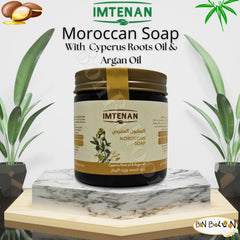 Bonballoon Moroccan Soap pouring lather in a warm bath setting.