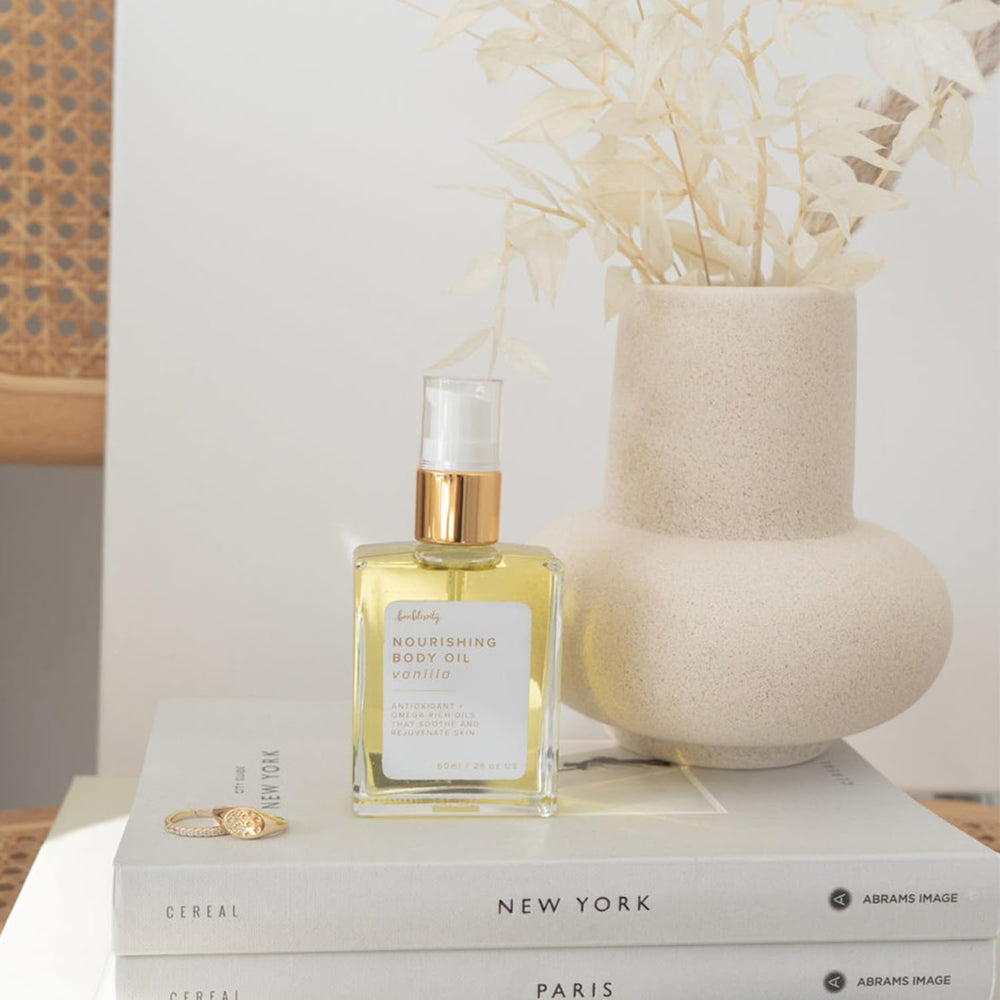 Bonblissity Nourishing Body Oil vanilla travel-size packaging for on-the-go moisture.