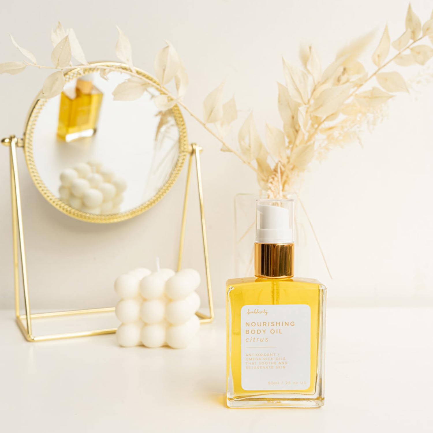 Bonblissity Nourishing Body Oils at elbows and knees showing targeted hydration