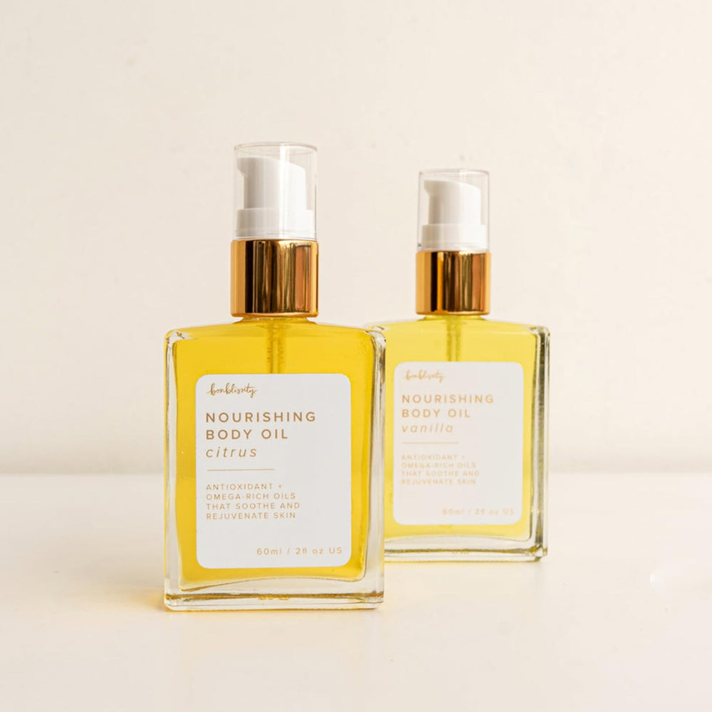 Bonblissity Nourishing Body Oils on tattoos demonstrating hydrating care