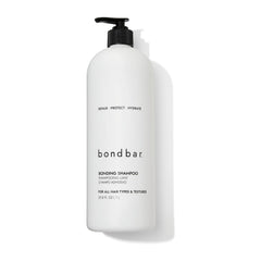Bondbar Repairing Shampoo bottle pour demonstrates hydration for all hair types.