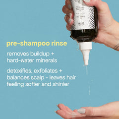 BondiBoost HG Clarifying Rinse being poured for easy pre-shampoo application.