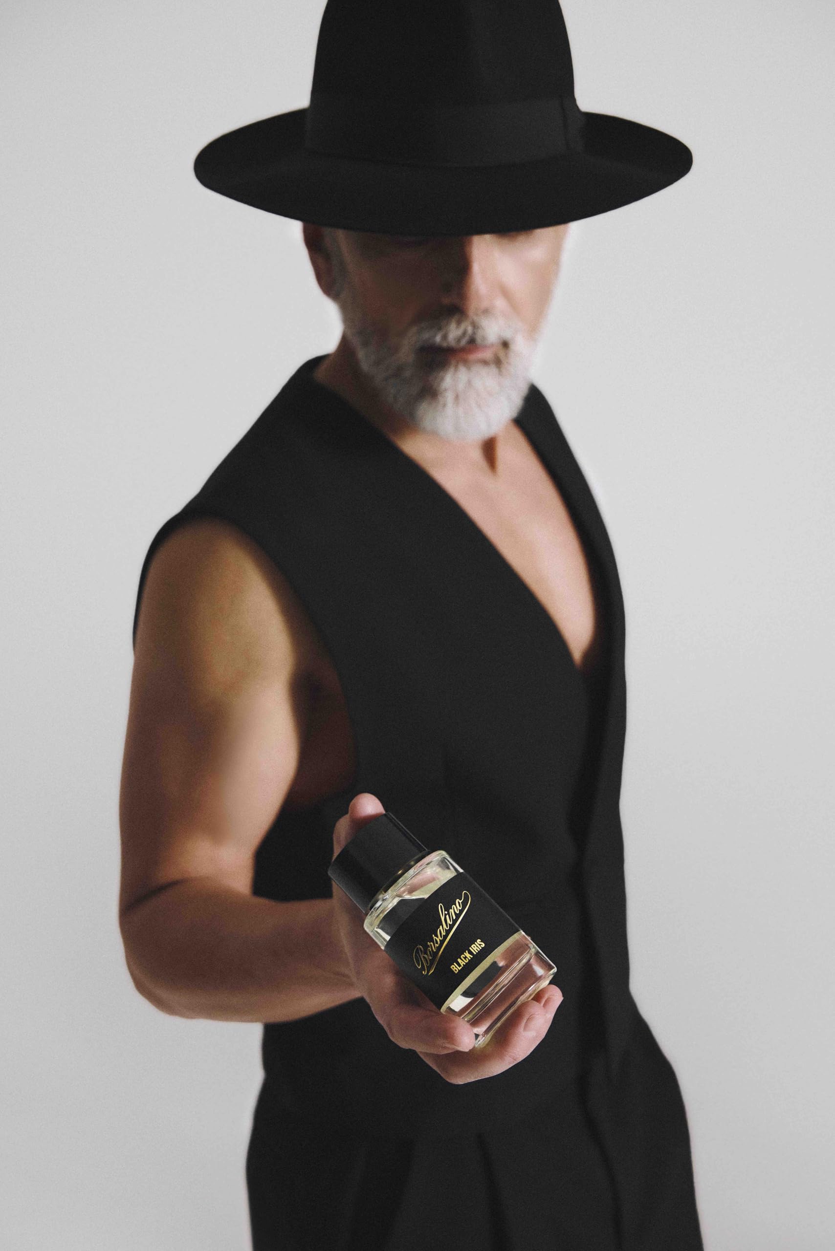Borsalino Black Iris base notes create a magnetic cedar-amber trail.
