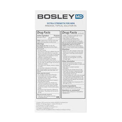 BosleyMD minoxidil dropper applying to the scalp for precise use.