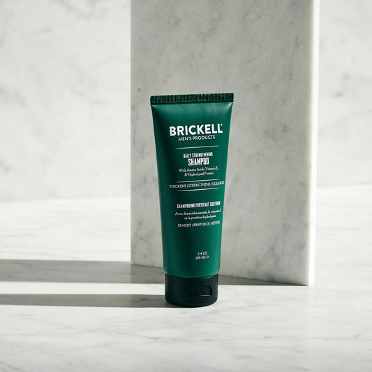Close-up of rich lather from Brickell shampoo with peppermint and tea tree