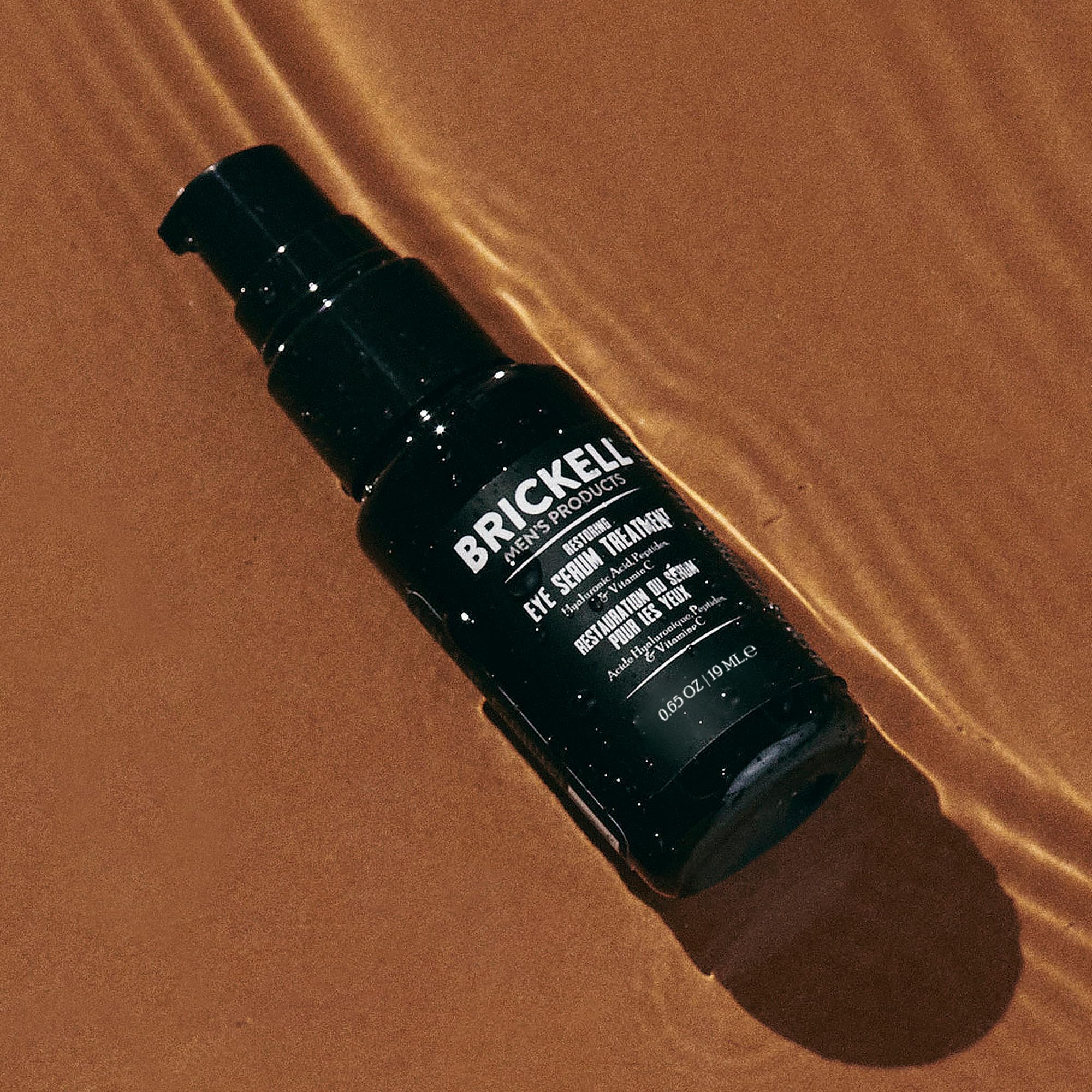 Brickell Men's Dark Circle Serum under-eye application scene, easy daily refresh.