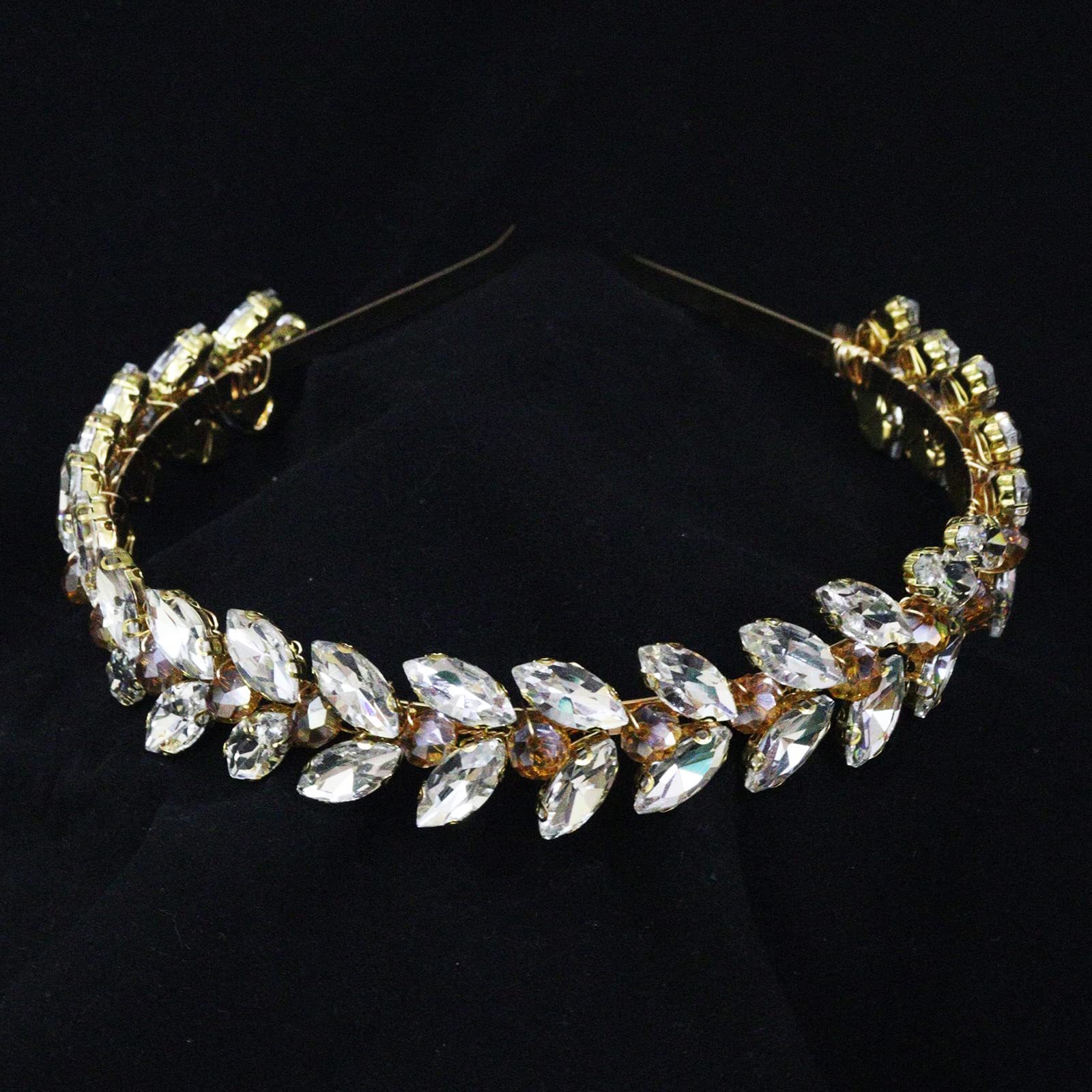 Brihasory green rhinestone headband closeup shows crystal facets.