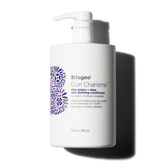 Briogeo Curl Charisma bottle pour demonstrates hydrating formula for defined curls.