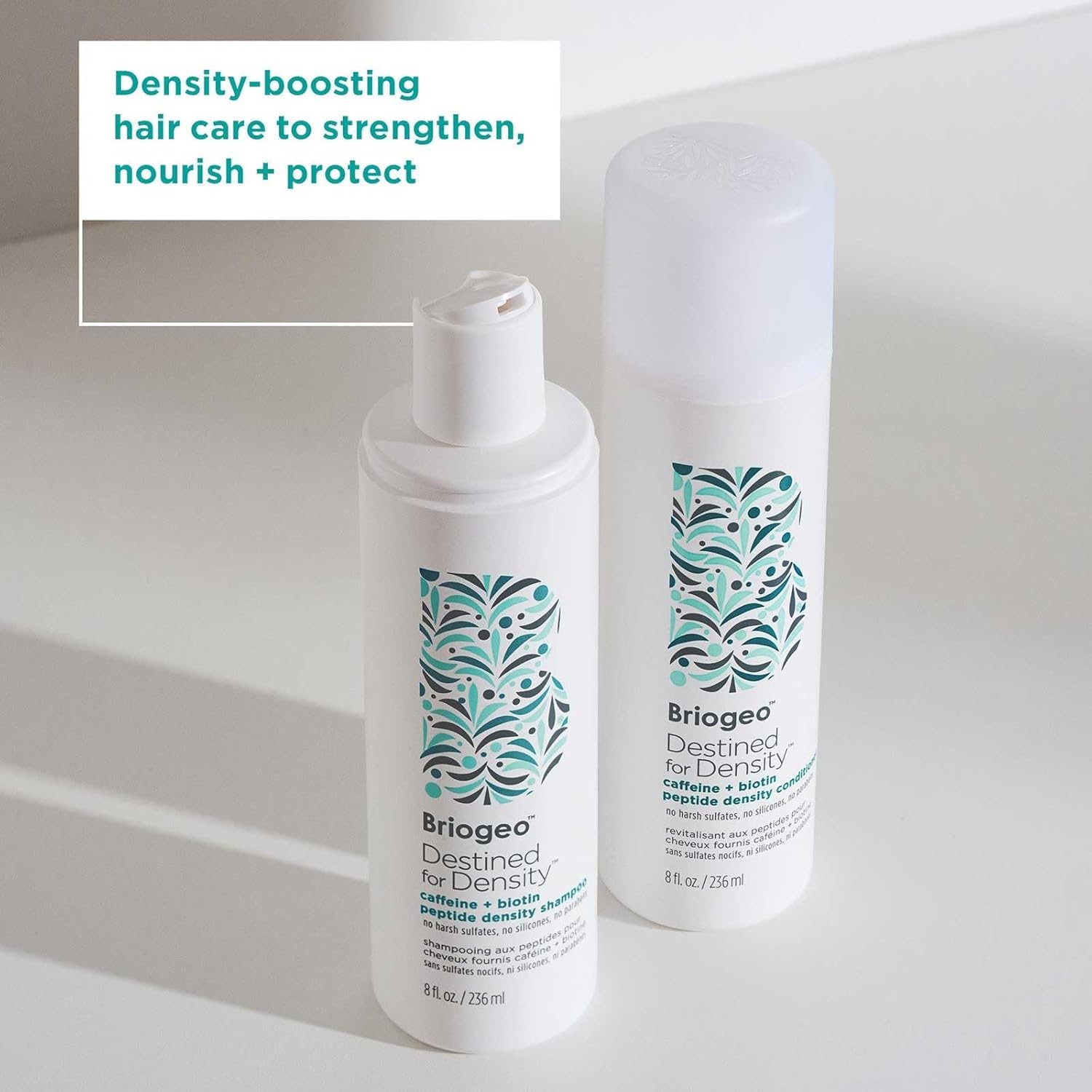 Briogeo Destined For Density bottle close-up emphasizing hair volume benefits