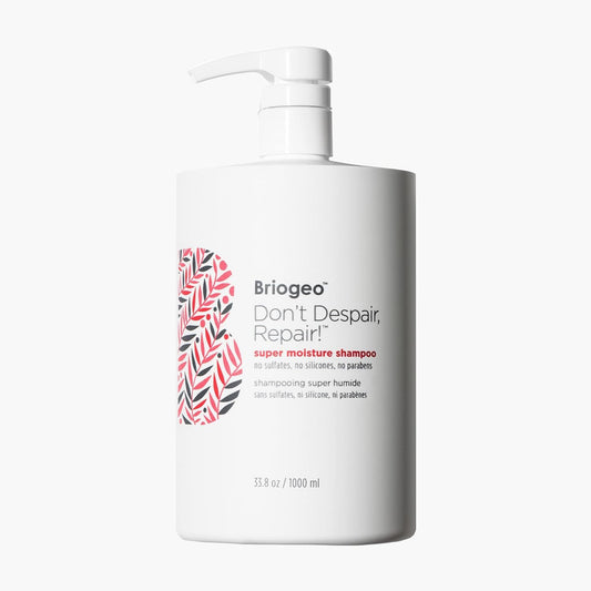 Briogeo Don't Despair, Repair! bottle pour shows a hydrating cleanse for dry hair.