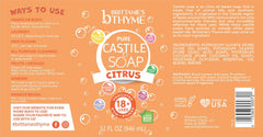 Brittanie's Thyme citrus castile bottle pouring for versatile dish, body, and hair cleansing.