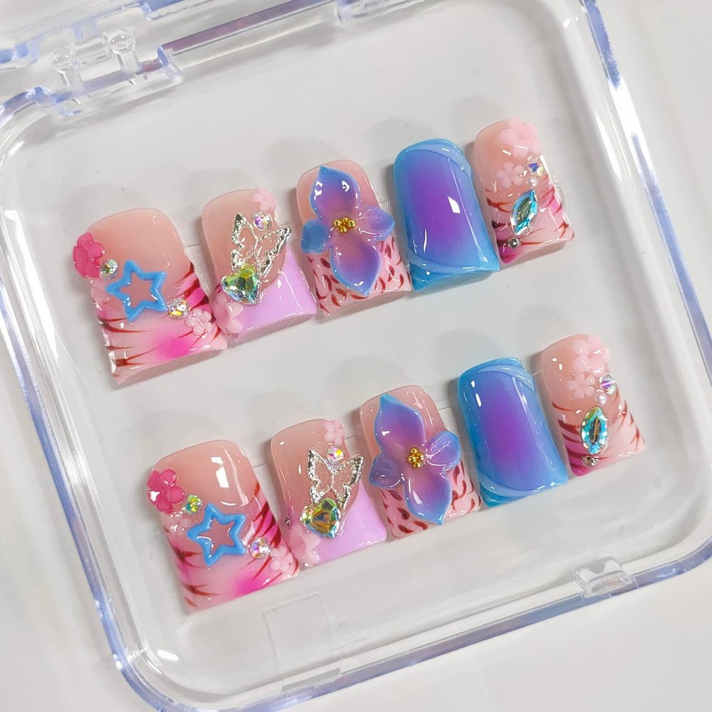 BRKYKGK 3D floral nail art on thick acrylic tips for long-lasting wear.
