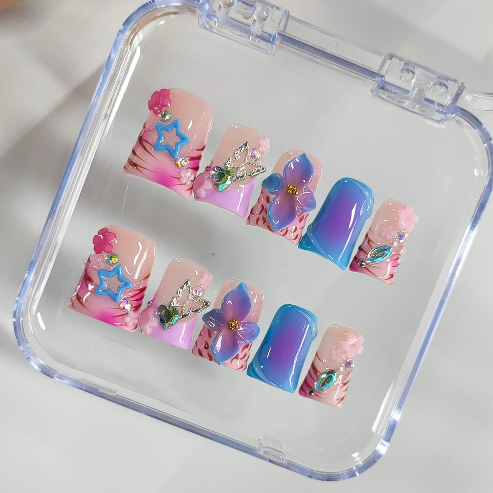 BRKYKGK butterfly and star nail art for whimsical evening looks.