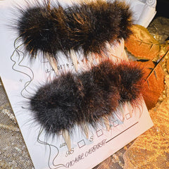 BRKYKGK Cat claw design nails with black fuzzy balls for bold style.