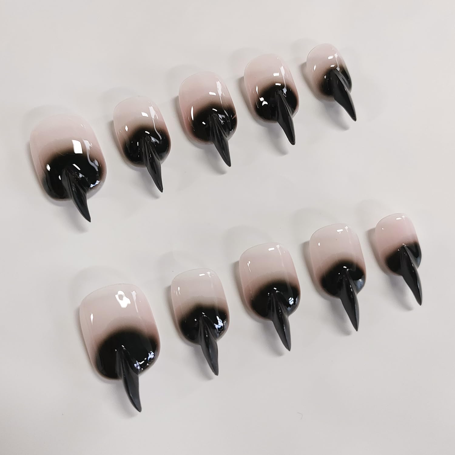 BRKYKGK Cat Claw nails glossy finish closeup highlights sleek shine.