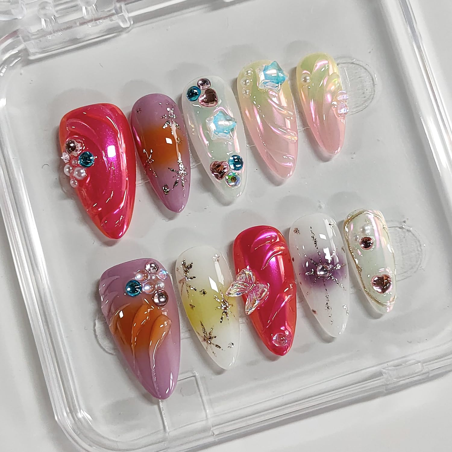 BRKYKGK 3D acrylic press-on nails in colorful almond shape for DIY manicure.