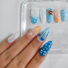 BRKYKGK French tip almond nails for a clean, versatile daily look.