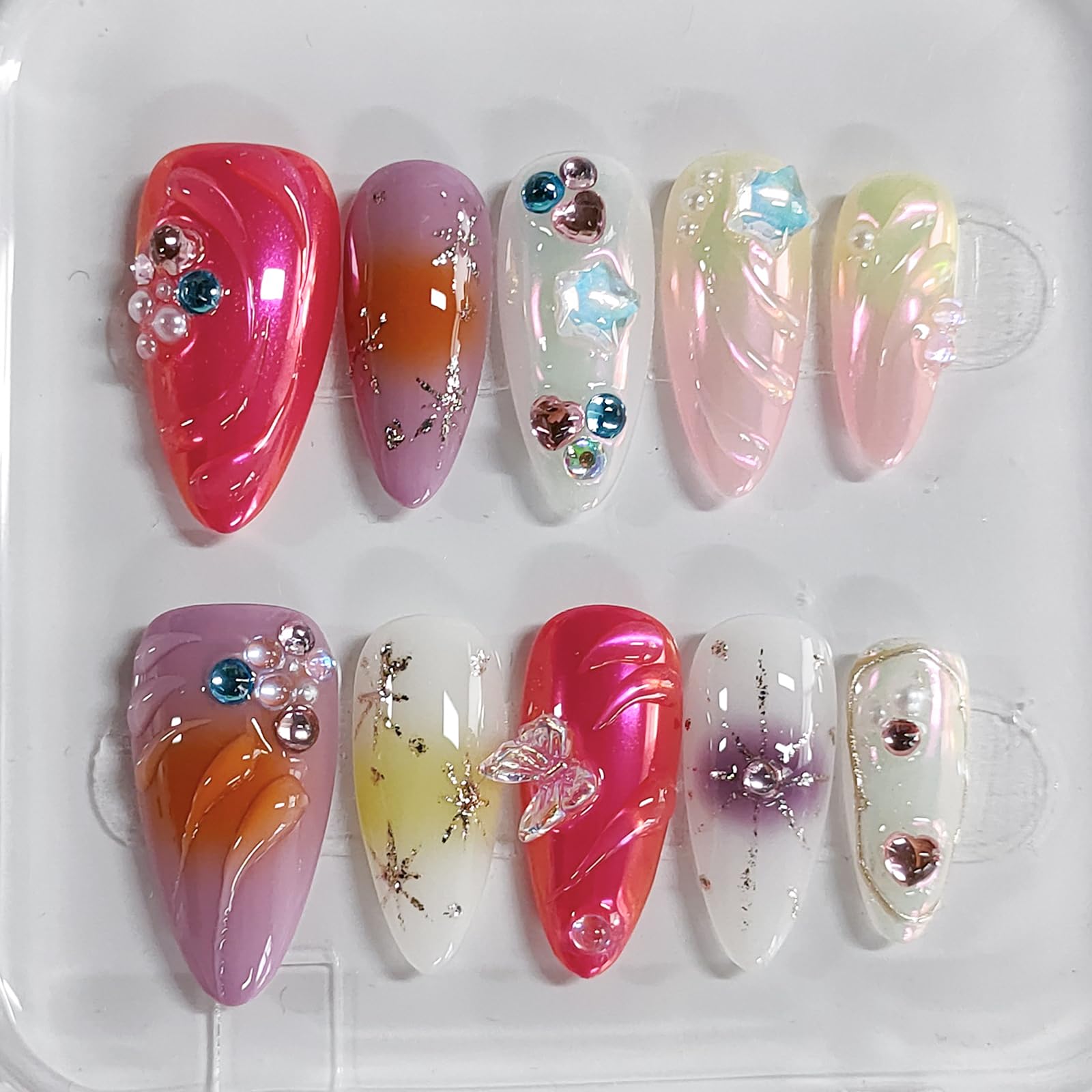 BRKYKGK handmade almond press-on nails with butterfly rhinestones for quick salon-worthy glam at home.