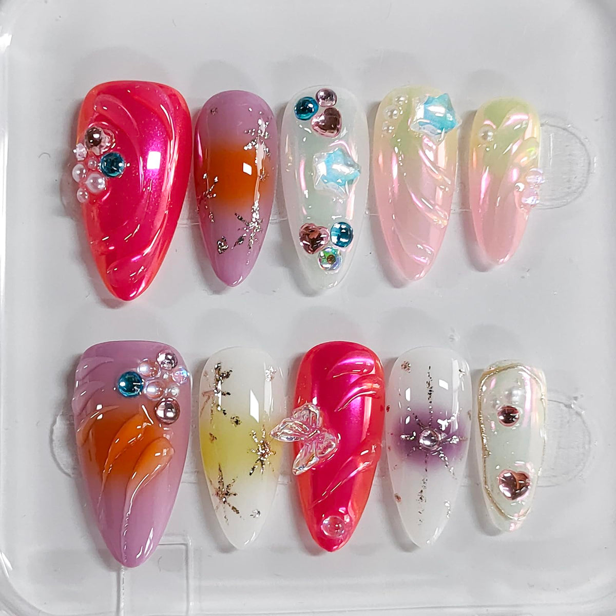 BRKYKGK handmade almond press-on nails with butterfly rhinestones for quick salon-worthy glam at home.