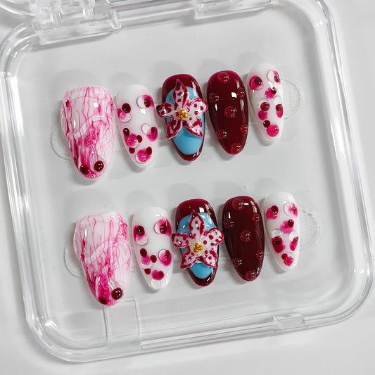 BRKYKGK almond medium nails with 3D floral design for fast salon-like nails at home.