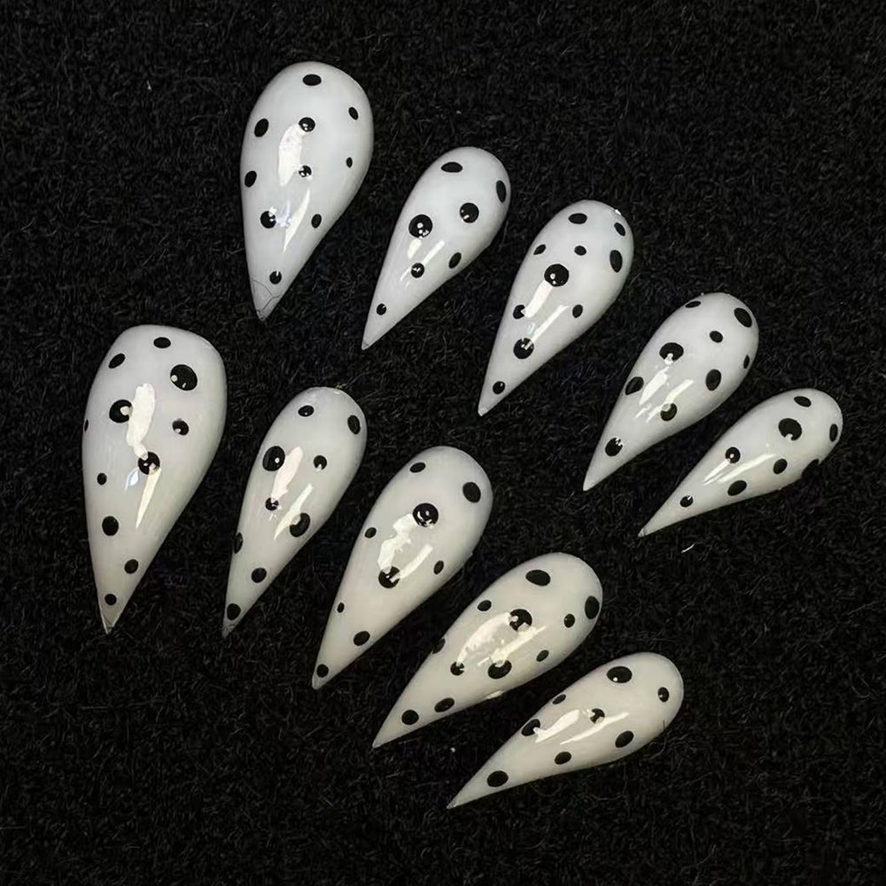 BRKYKGK medium stiletto eagle claw nails with black and white polka dots for quick glam