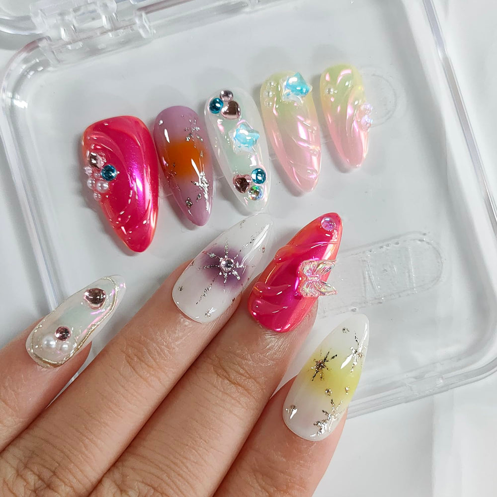 BRKYKGK almond set featuring stars and water ripple design for playful, colorful nails.
