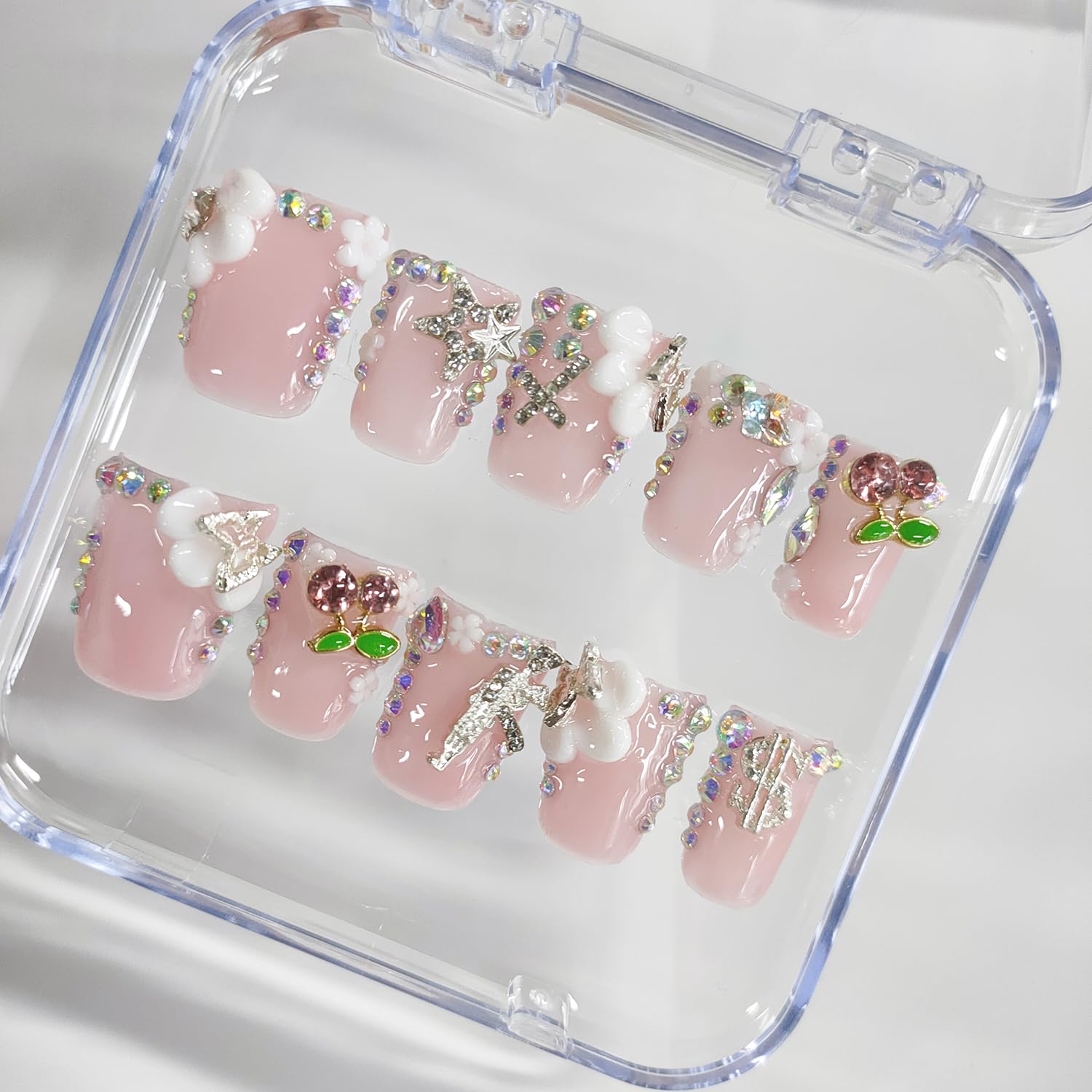 BRKYKGK press-on nails with white French tip and flowers for chic evenings.