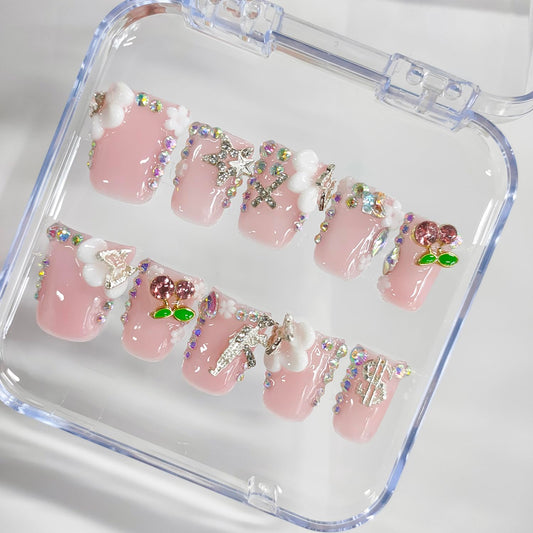 BRKYKGK press-on nails with white French tip and flowers for chic evenings.