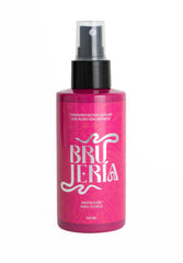 Brujeria hair heat protectant spray pink bottle front for frizz control