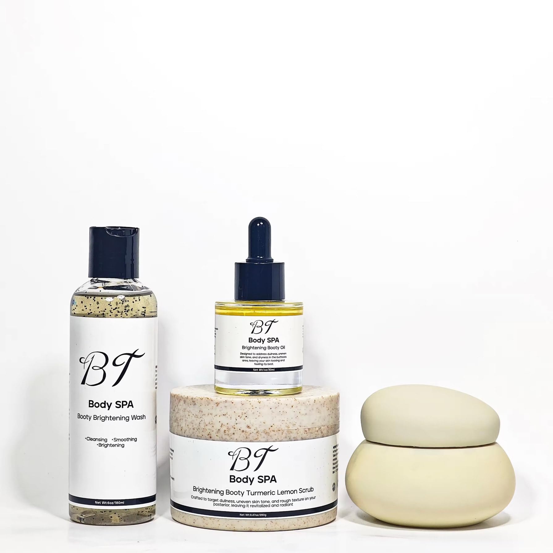 BT Booty Spa Scrub bottle highlighting turmeric-lemon formula for brighter, smoother booty skin.