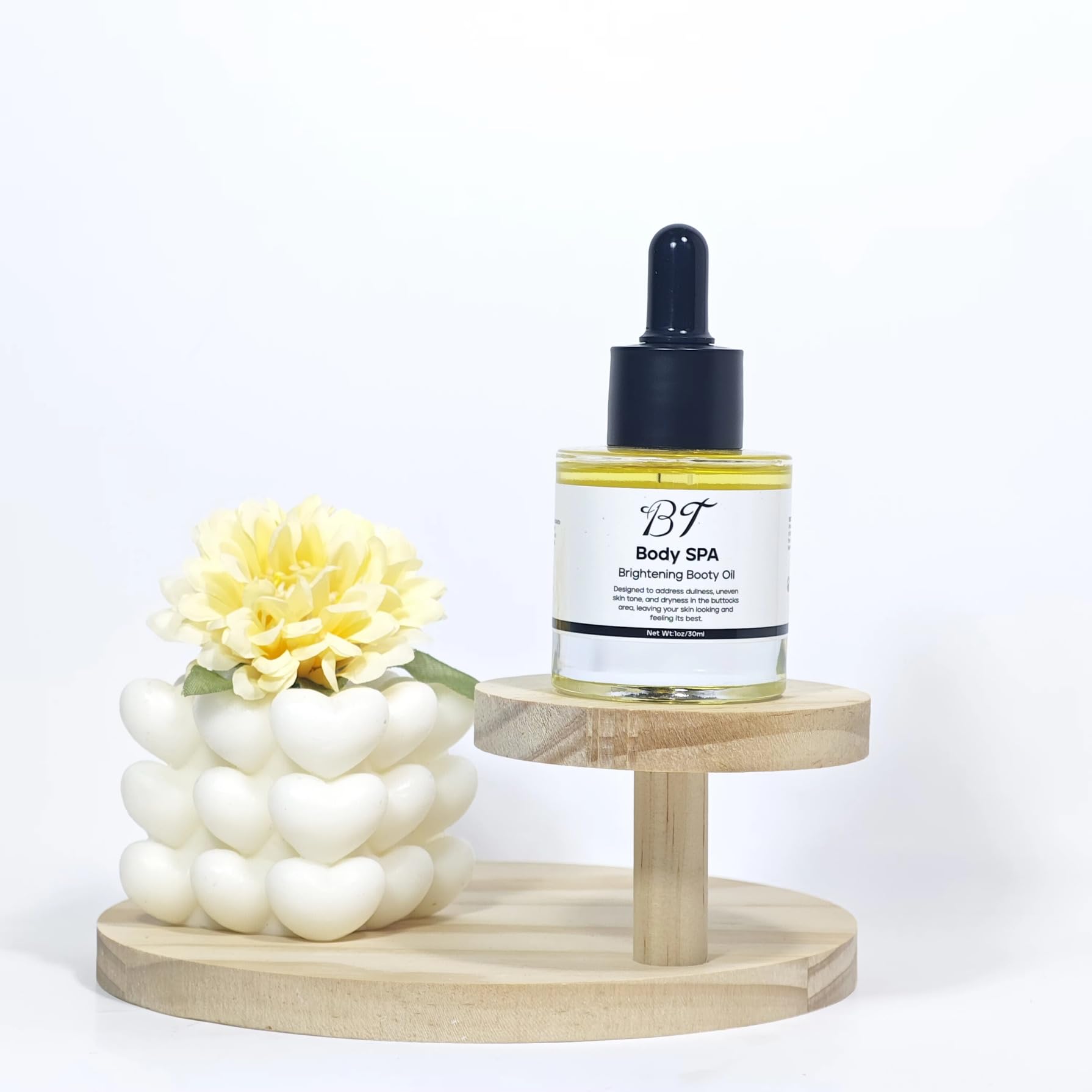 BT Booty Spa Scrub creamy texture visible in jar for gentle exfoliation and hydration.