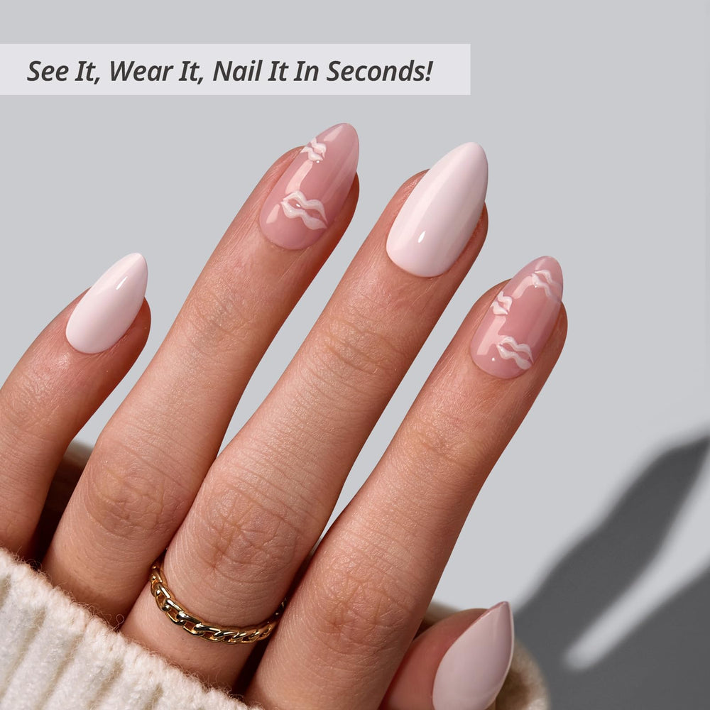 BTArtbox Dainty Kiss nails on hand show natural almond shape for everyday wear.