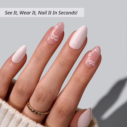 BTArtbox Dainty Kiss nails on hand show natural almond shape for everyday wear.