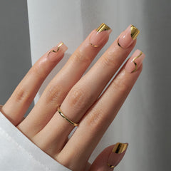 BTArtbox closeup of gold-tip design nails for elevated everyday style