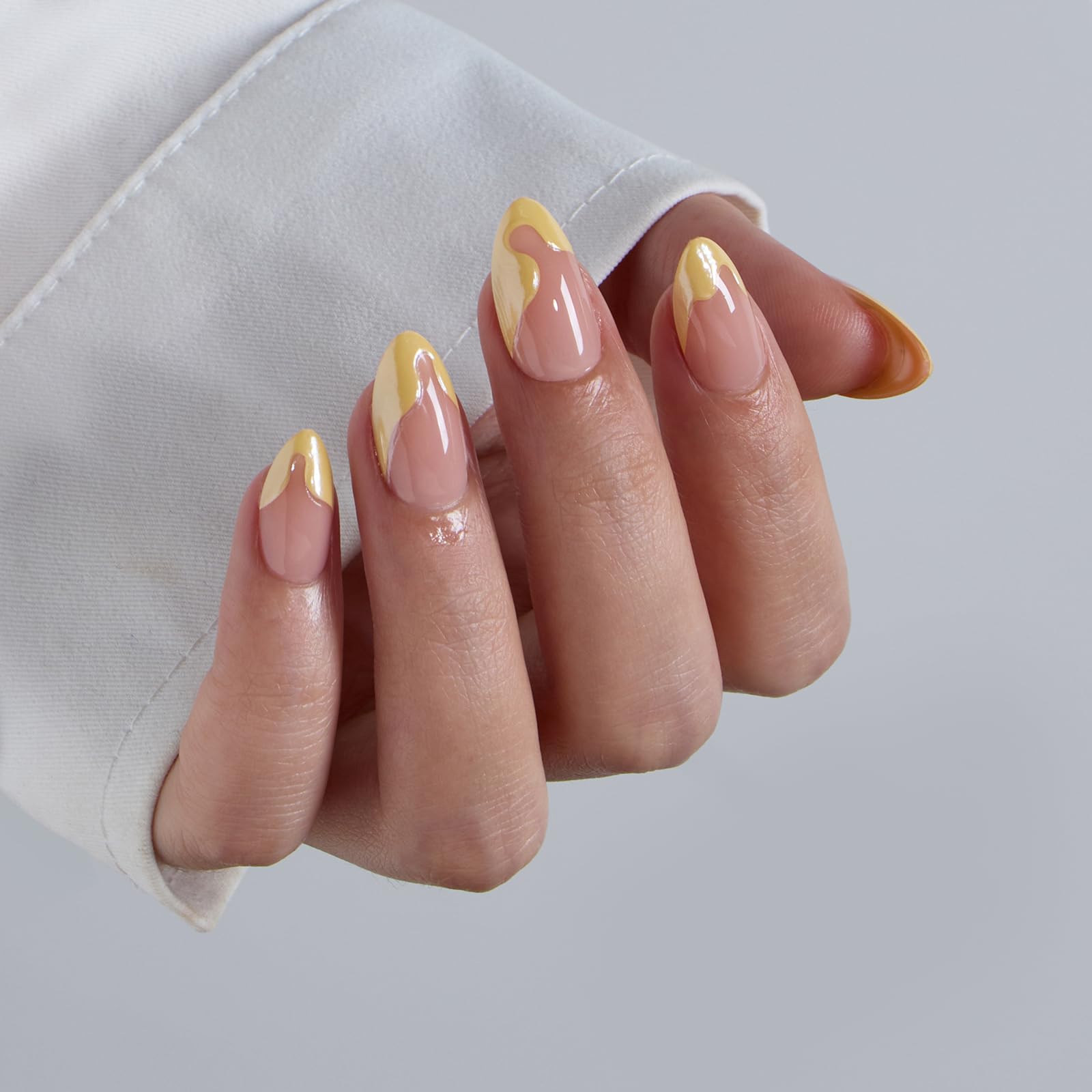 BTArtbox nails under lamp for instant cure with gel glue.
