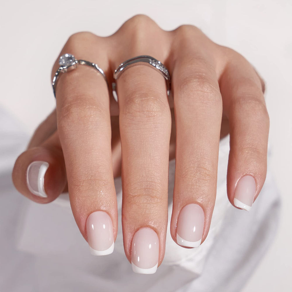 BTArtbox white French Tip nails demonstrates square shape for a salon-like finish.