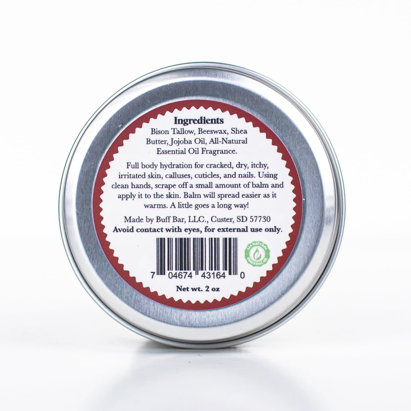 Buff Bar balm texture close-up shows rich moisture for dry skin.