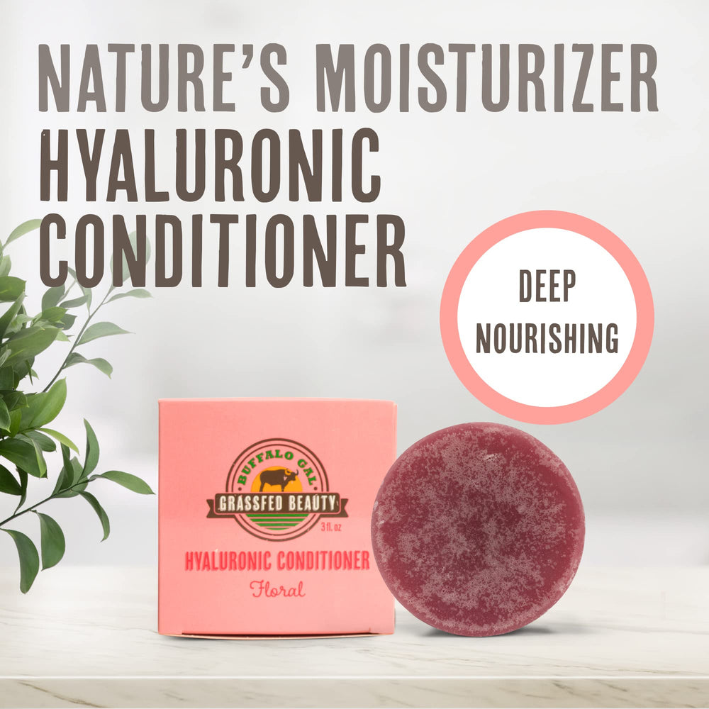 Buffalo Gal conditioning bar in hand showing portable hydration and easy application.