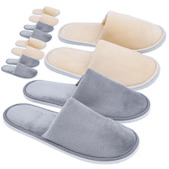 Buoluty individually packaged slippers ready for guest use.