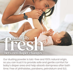 Diaper bag scene with Burt's Bees Baby Dusting Powder for on-the-go care