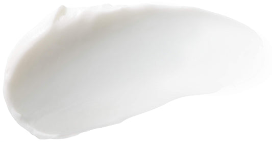 Applying Burt's Bees peppermint oil foot lotion to dry heels for deep moisture.