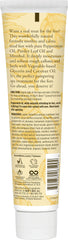 Creamy peppermint foot lotion texture smoothing rough skin.