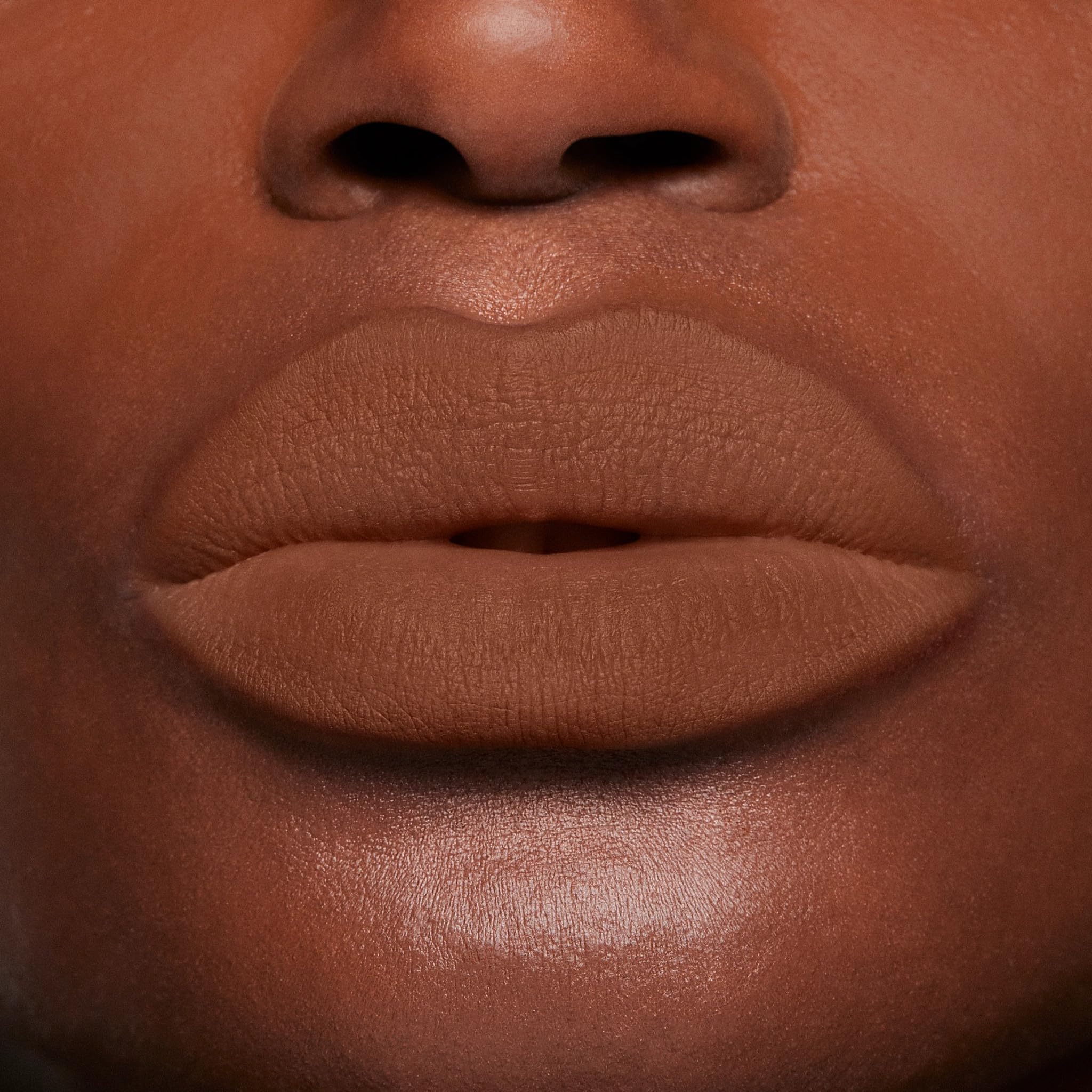 BUXOM After Hours close-up shows plump-looking lips and moisture from Vitamin E.
